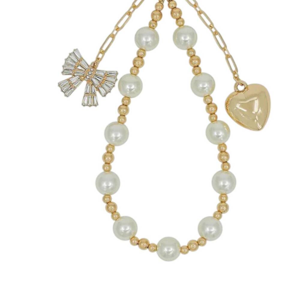 NEW WHAT'S HOT heart luxe phone wristlet in gold